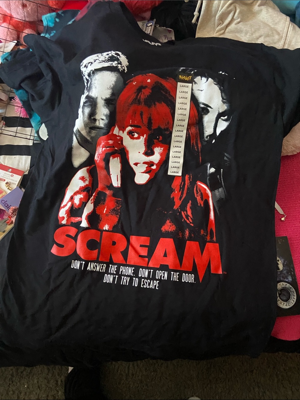 Spirit Black Tee with Red and White Scream Graphic